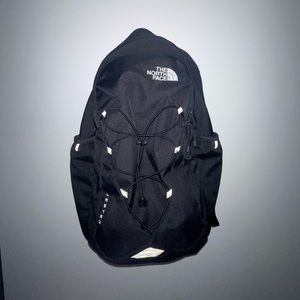 The north face jester backpack in all black.